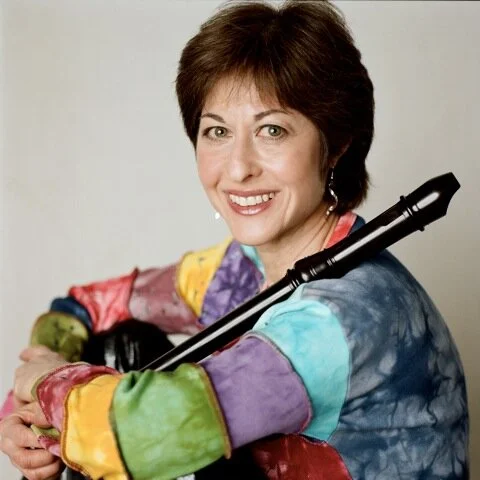 Judy Linsenberg holding a recorder